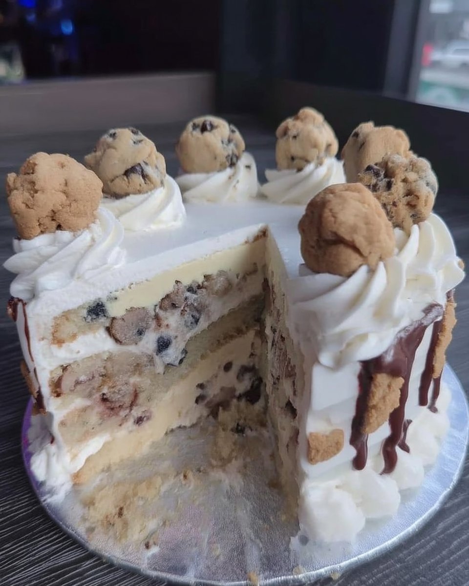 Slice of chocolate cookies and cream cake with oreo buttercream