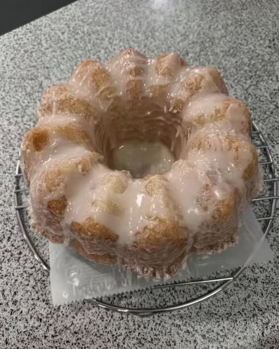 Electric mixer beating butter and sugar in a bowl