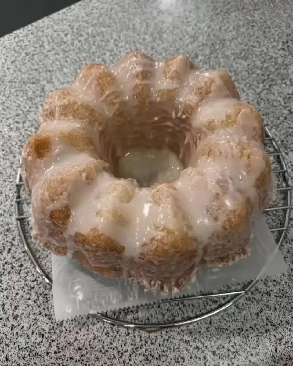 Electric mixer beating butter and sugar in a bowl