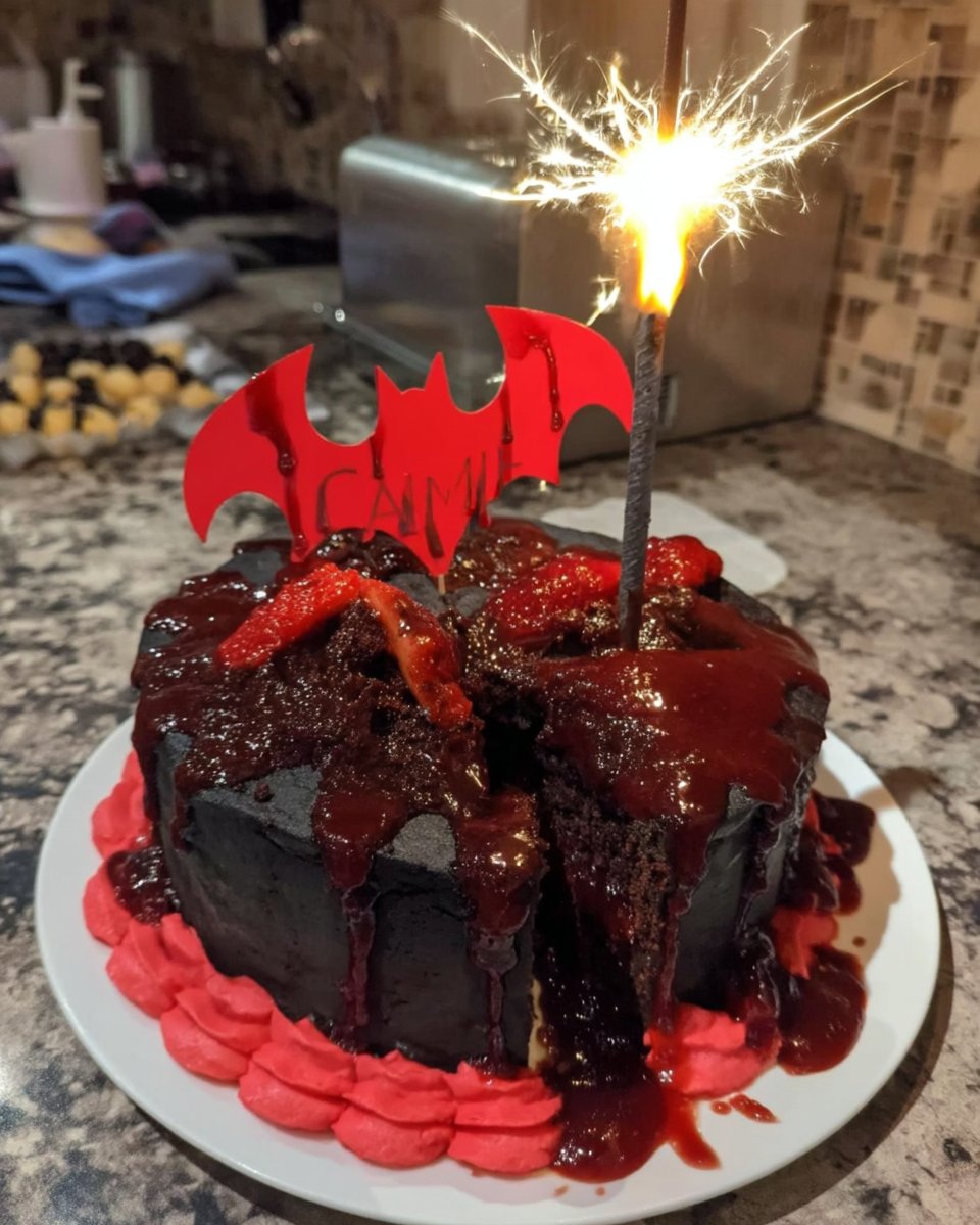 Batman Cake 13 Cutting batman shapes out of black sheet cake