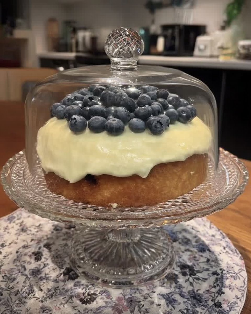 Lemon Blueberry Cake 10 Slice of lemon blueberry cake with lemon buttercream and fresh berries