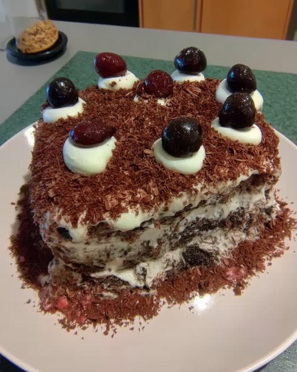Frosting a chocolate layer cake with whipped ganache