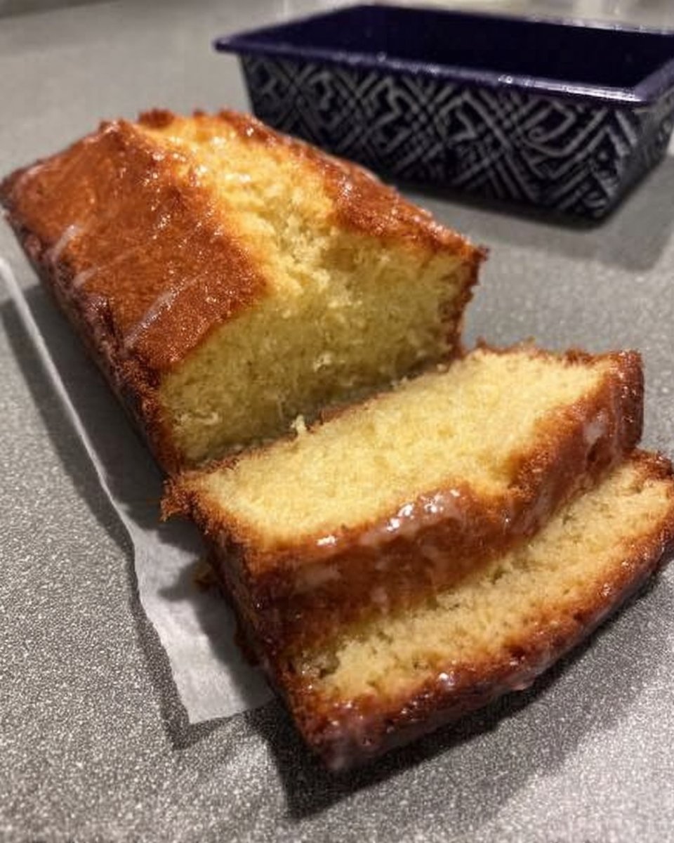 Ingredients for lemon drizzle cake including fresh lemons and butter
