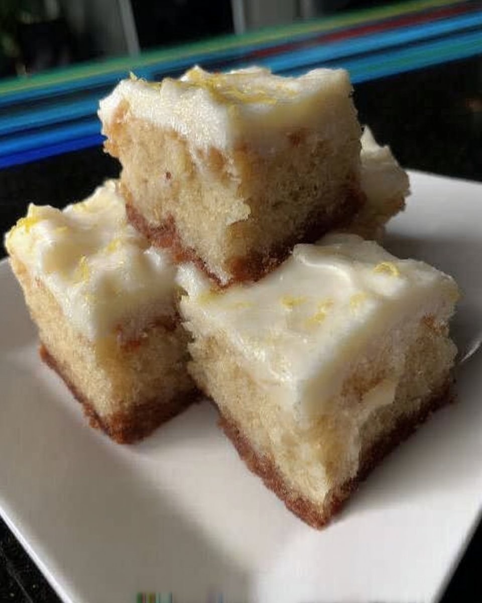 Bowls of flour butter sugar eggs and fresh lemons