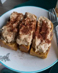 Slice of moist pumpkin spice cake on a plate
