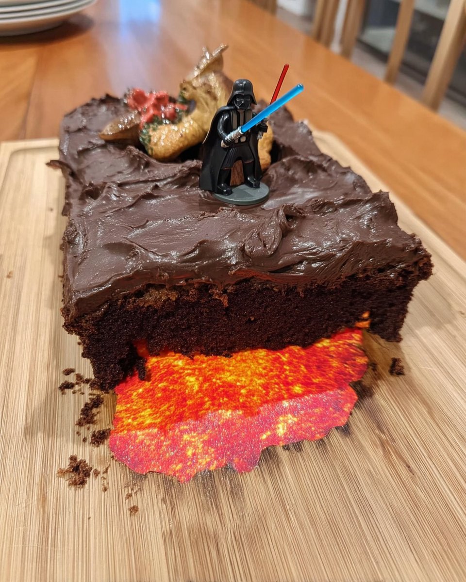 Star Wars Cake 13 Smoothing white fondant over the shaped cake base