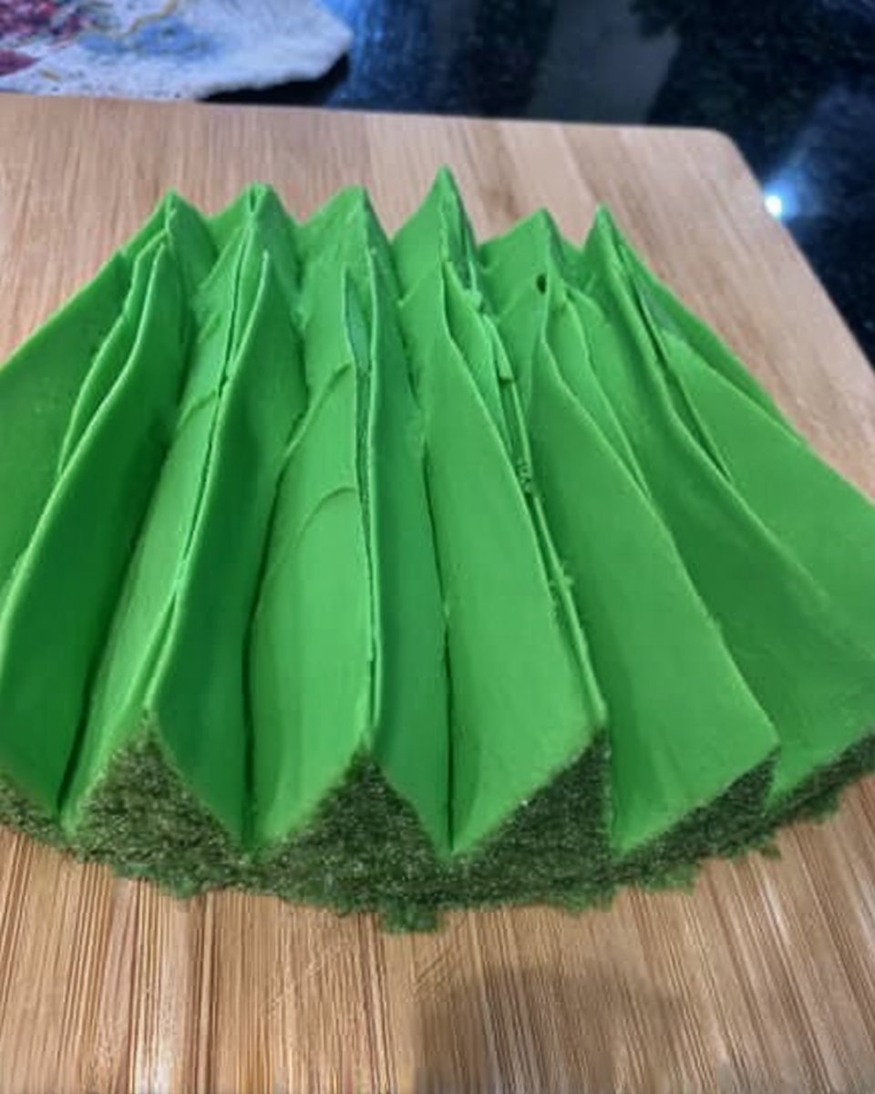 Adding milk to chocolate sponge cake layers