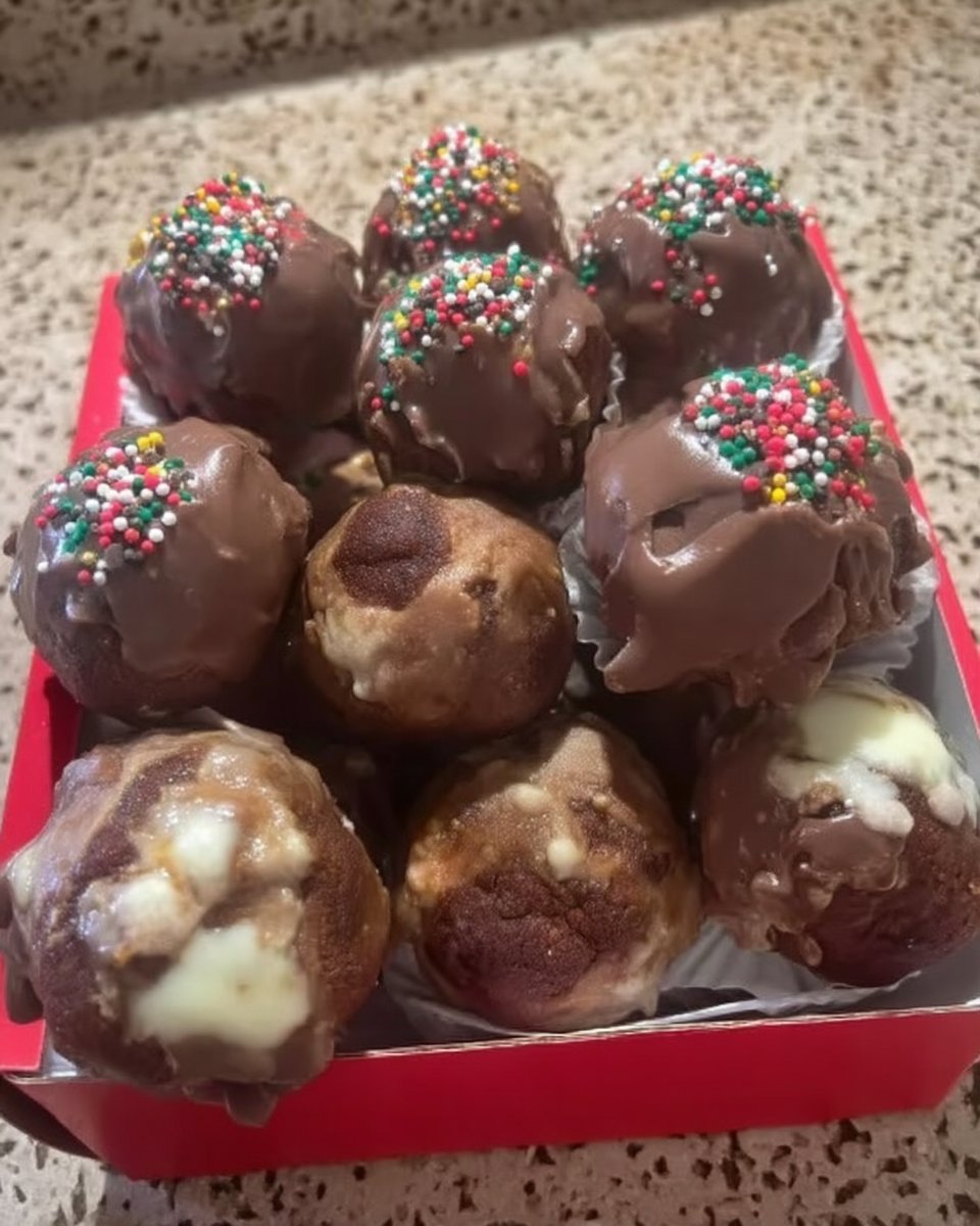 Whisking dark chocolate cake batter in a bowl