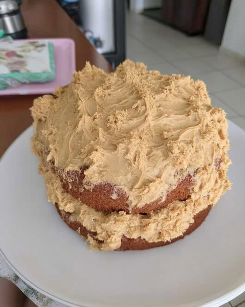 Yellow Cake with Chocolate Frosting 12 Bowls of flour sugar eggs and cocoa powder arranged for baking