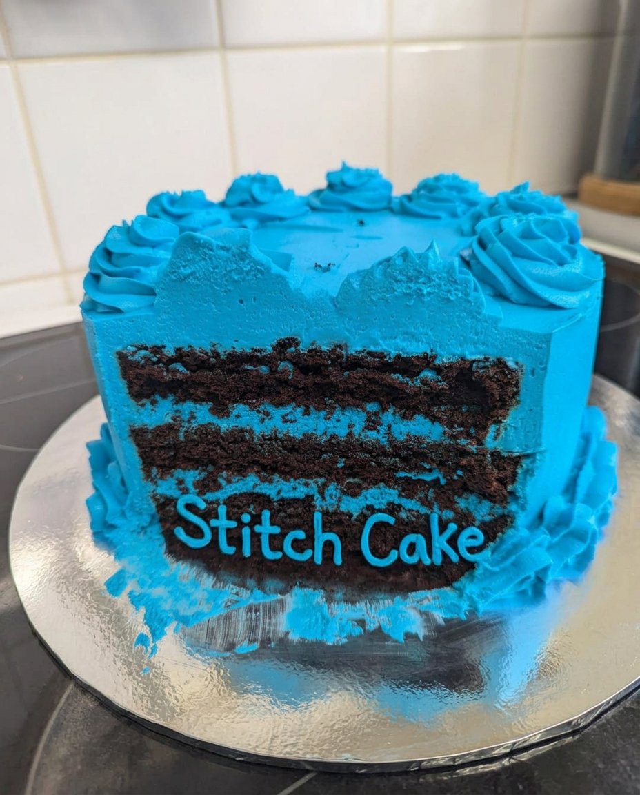 Close up of glossy white Swiss meringue buttercream in a mixing bowl