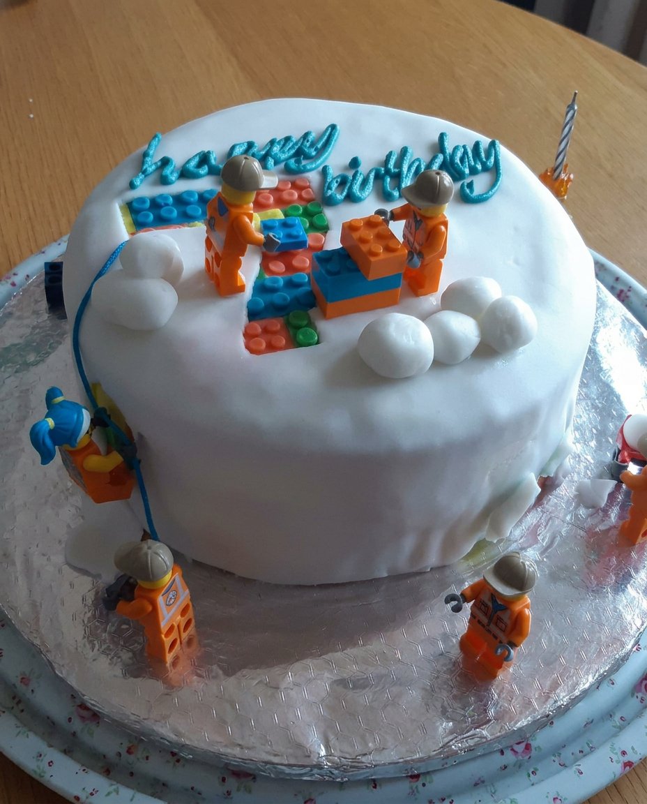 Slices of boys soccer cake served on colorful plates with forks