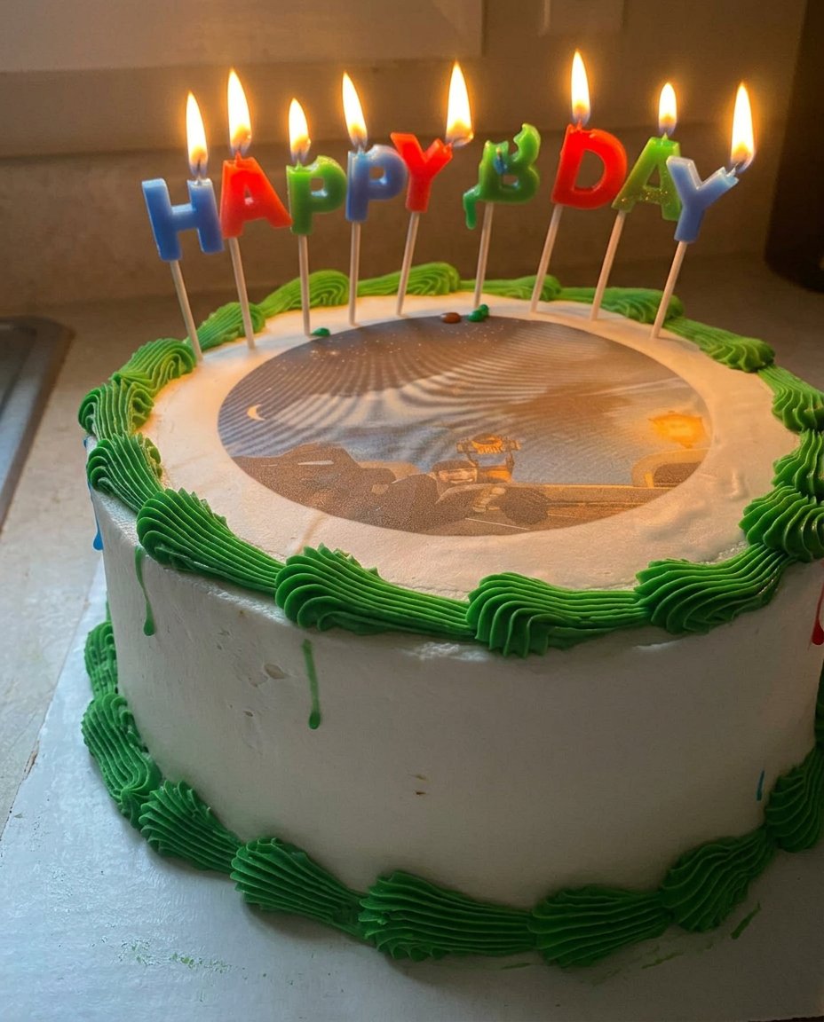 A simple homemade photo cake with a creamy top and graham cracker crust