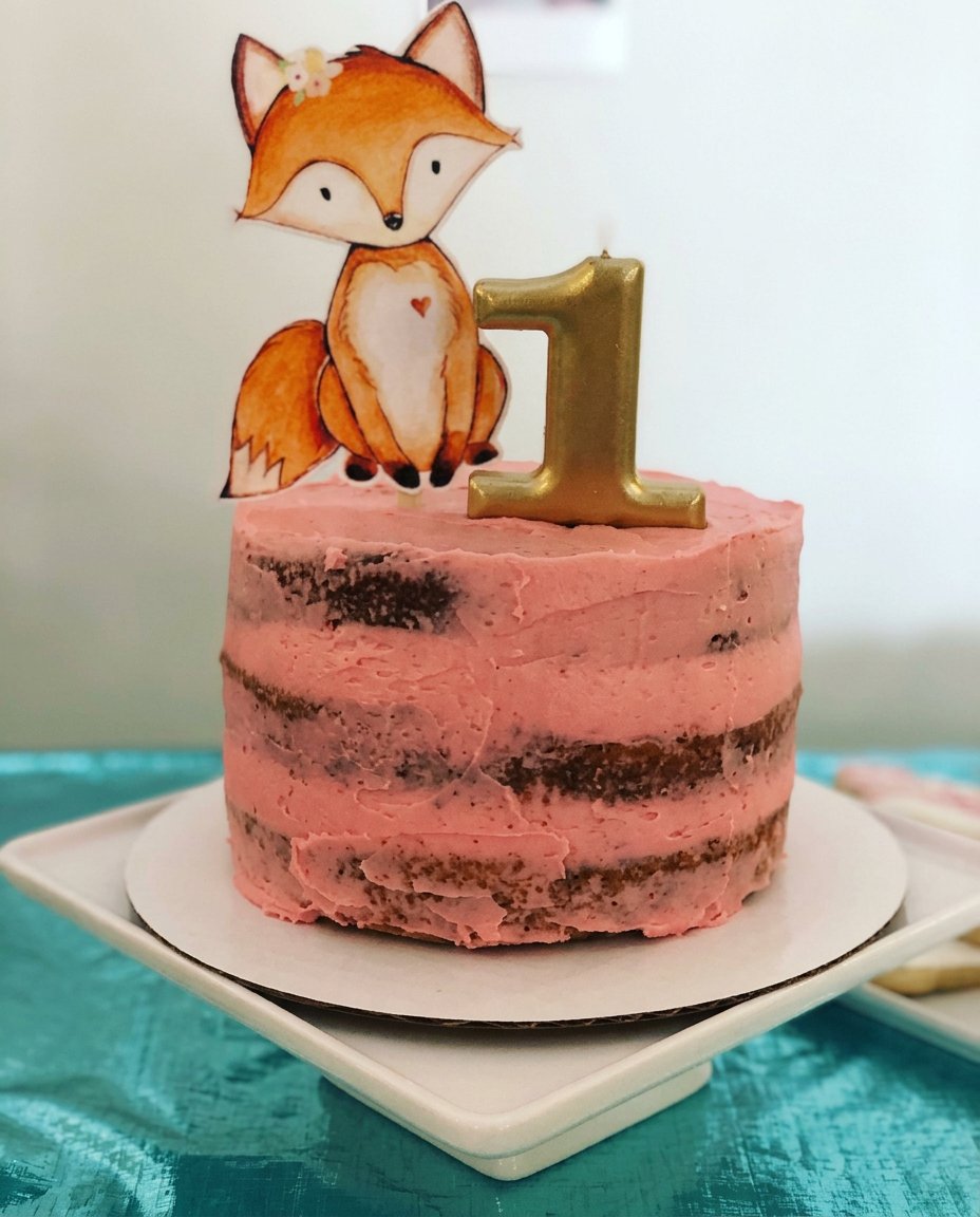 A mixer whipping eggs and sugar into a pale foam