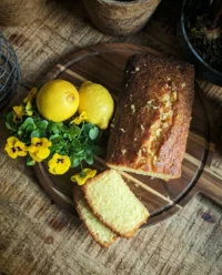 Freshly baked easy lemon drizzle cake 3 cooling on a wire rack