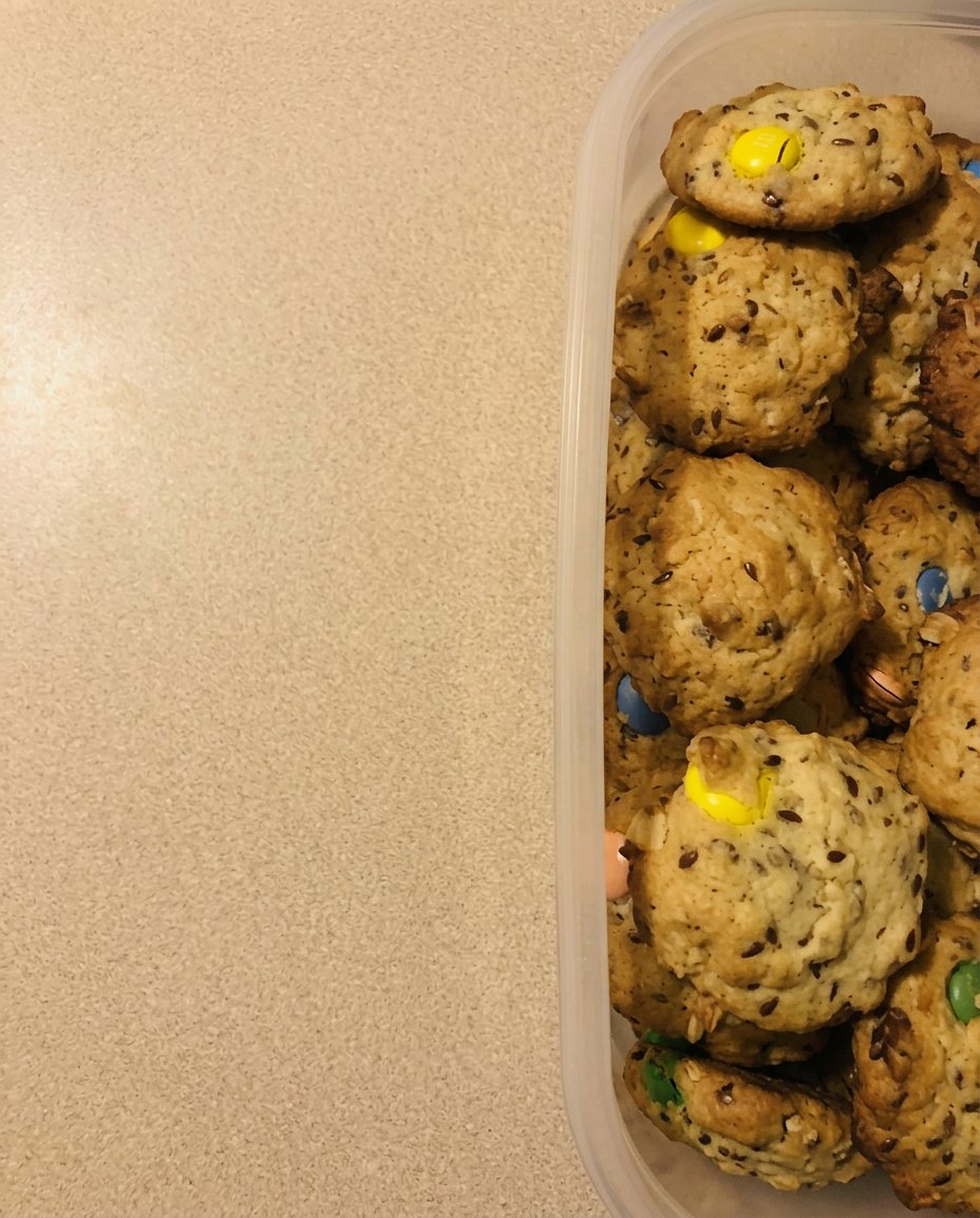 Pantry staples like cake mix cookies and butter on a counter