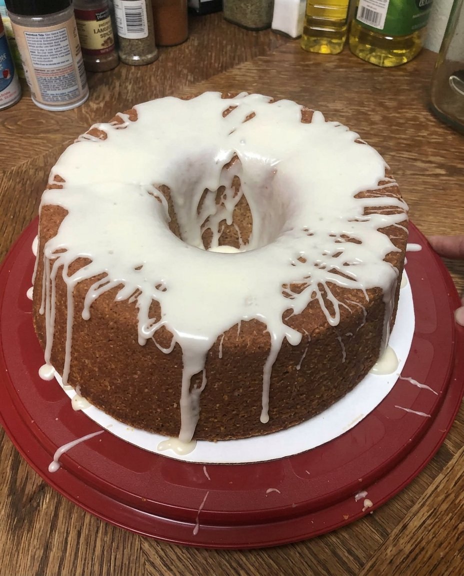 Ingredients for 7 Up Cake including yellow cake mix, lemon pudding, and a bottle of 7 Up soda