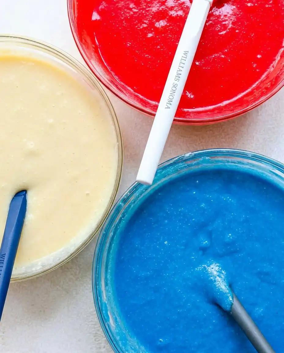 Red, White, and Blue Marble Cake 13 Three bowls of cake batter colored red, white, and blue