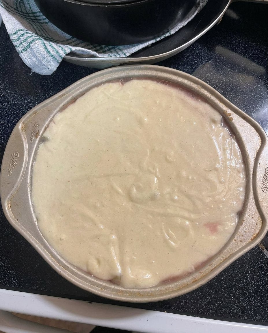 Crushed pineapple being drained in a sieve for cake frosting