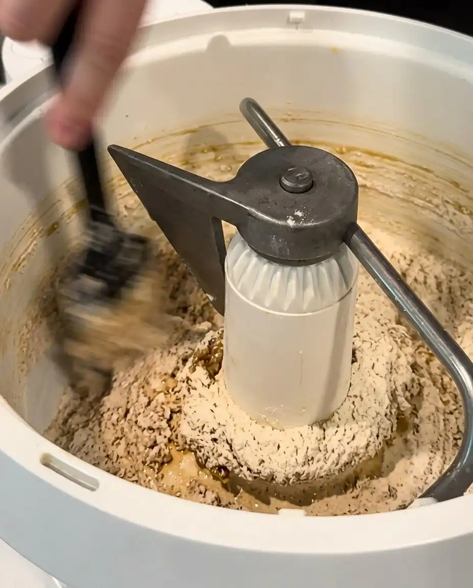 Butter sugar and chocolate chips prepared for a chewy cookie cake recipe