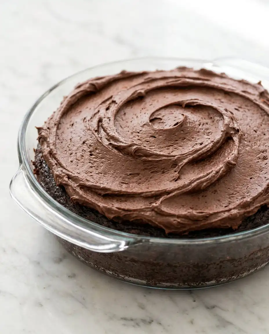 Devil's Food Layer Cake 14 Bowls of cocoa powder, flour, and coffee for a Devil's Food Layer Cake.