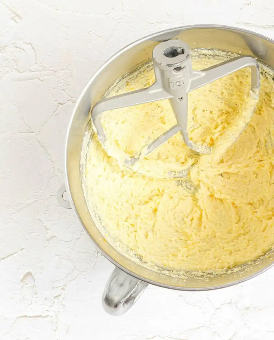 Pantry staples like orange cake mix, juice, and pudding mix for making Orange Creamsicle Cake.