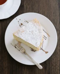 A light and airy Italian Lemon Mascarpone Layer Cake dusted with icing sugar