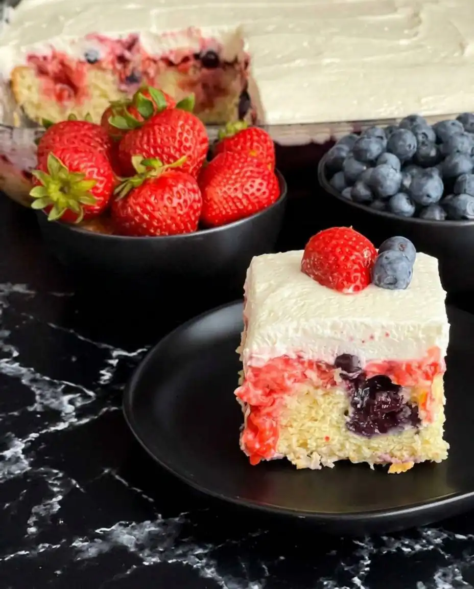 Using a wooden spoon handle to poke holes in a freshly baked cake