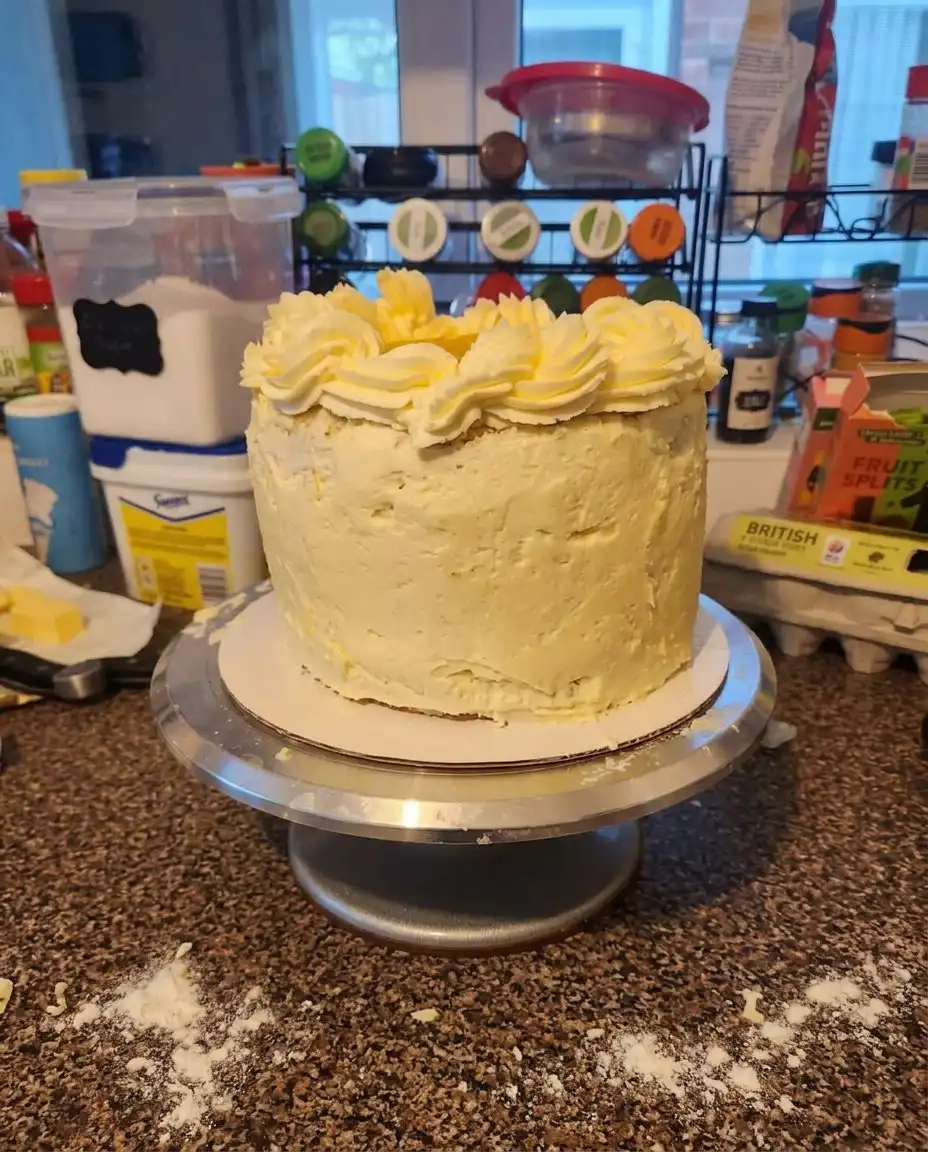 Several slices of Orange Creamsicle Cake ready to be served at a party.