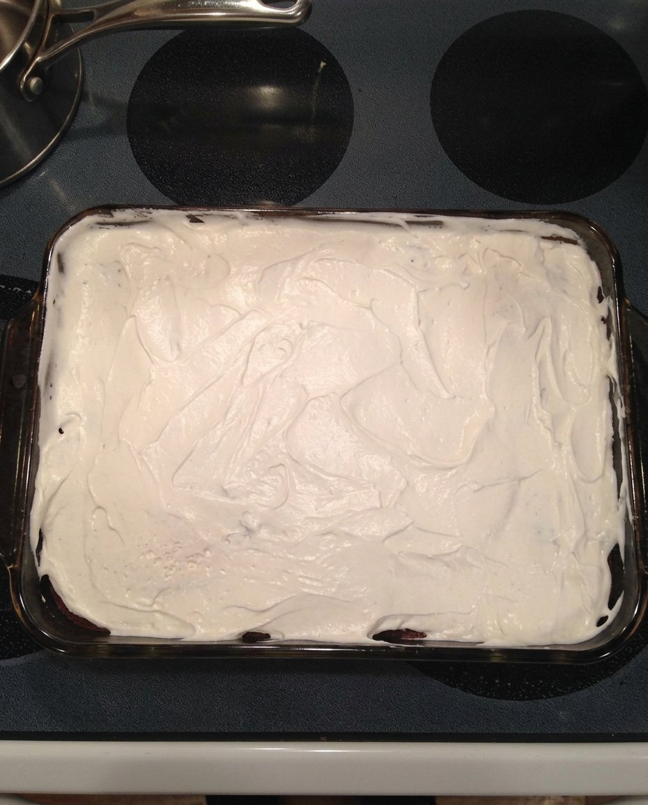 Golden brown toasted pecan crust in a baking dish