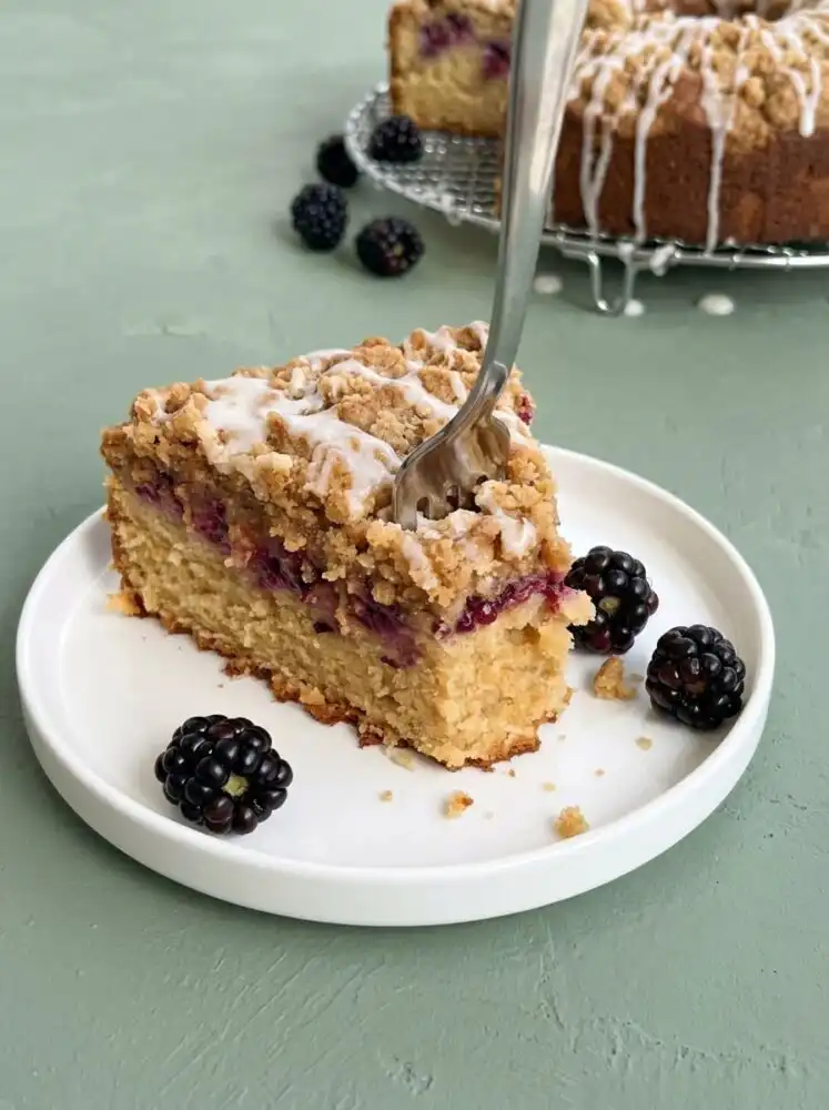 Home - Cake Savor - Savor the Simple 7 A beautiful slice of fresh Blackberry Coffee Cake with a sweet vanilla glaze drizzle on top.