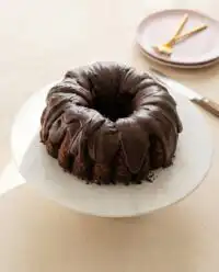 A delicious slice of fudgy Double Chocolate Zucchini Cake showing the moist crumb